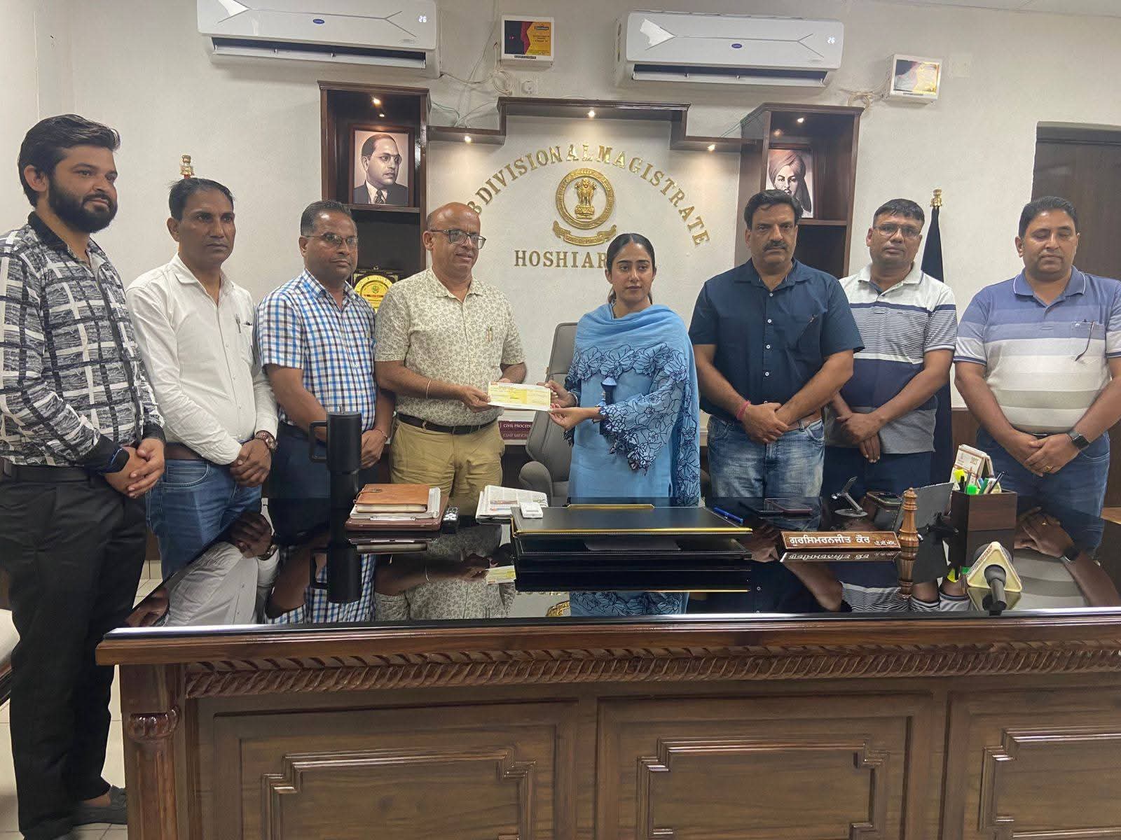 Teachers donate Rs 1 lakh to help flood victims.